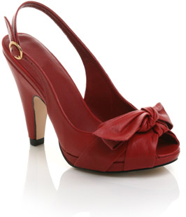 Leather sandal featuring large bow detail on front. The Lawlow peep toe sandals have a high covered 