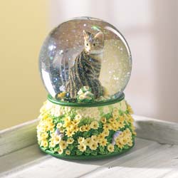This glass and polyresin waterglobe is based on a painting by the celebrated cat artist, Lesley