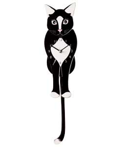 Black and white cat. Quartz pendulum movement. Requires 2 x AA batteries (included). Size (H)40,