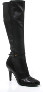 Leather and patent high leg boots with buckled ankle strap detail and cross over straps on toe. The 