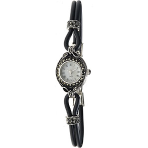 This vintage-style watch features a sterling silve