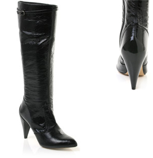 Almond toe patent leather high leg boot featuring strap with buckle detail and a high heel. Perfect 