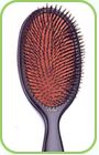 This is a large  hairbrush, made of pure boar bris