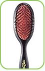 This is a medium sized hairbrush, made of pure boa