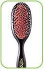 This is a medium sized hairbrush, made of a mixtur