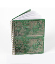 This note book is 16 x 21cm and has 80 plain pages.Made in the UK from recycled circuit boards. In t