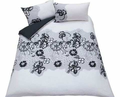 Combining fierce winter monochrome with a pretty oriental flower design this striking Mia double duvet cover with pillowcase sets your bedroom trends ahead. Set includes 1 duvet cover and 2 pillowcases. Machine washable at 40?C. Made from 50% polyest