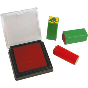 A set of eight miniature  suitably seasonal rubber stamps  with ink pad - all packed into a 3``