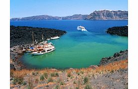 Board the Manolios and cruise to the volcanic island of Nea Kameni where you can walk up to the crater edge before heading to Palea Kameni, for swimming in the hot springs and therapeutic mud baths.