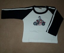 White top with motorbike print on the front. Navy