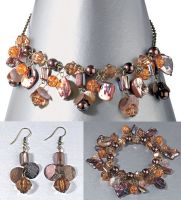 Expanding bracelet co-ordinates beautifully with Multi Brown Bead Necklace And Earrings Set