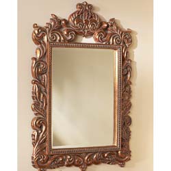 Crafted in polyresin, our luxuriously gilded mirror frame is the epitome of Louis Seize