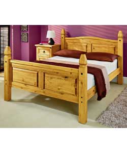 Solid pine double bedstead with an antique stain. Size (W)152.2, (L)205.2, (H)110cm. Supplied with s
