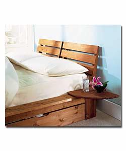 Sturdy solid pine bed in new continental design with faux leather headboard and 2 clip-on bedside ta