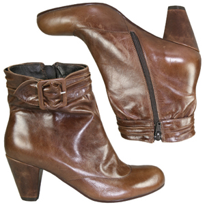 A smart ankle boot from Jones Bootmaker. With strap and buckle to top, zip fastening and round toe, 