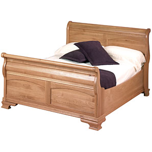 A high quality double sleigh design bedstead with