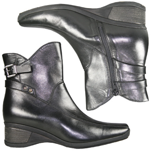 A fashionable Wedge heel ankle boot from Jones Bootmaker. With decorative cross over strap and buckl