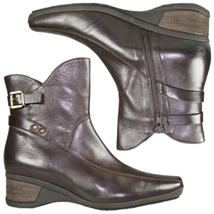 A fashionable Wedge heel ankle boot from Jones Bootmaker. With decorative cross over strap with buck