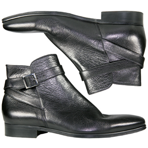 A modern jodhpur style boot from Jones Bootmaker. Features wrap around strap with buckle detail, cru