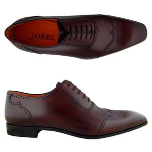 A modern 5 eyelet Oxford from the `One` range by Jones Bootmaker. Features unique Wing-tip brogue de