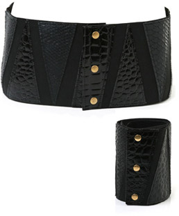 Wide elastic waist belt featuring mock croc patent panels and three metal button fastening. Sexy and