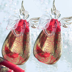 Eye-catching spun glass tabletop decoration in hand-made red and gold leaf. Candle not supplied