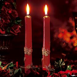 Our red and gold candles will add an ambient glow on those dark Christmas days