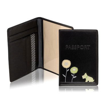 This is a fun passport holder which also features internal credit card holders. It is decorated with