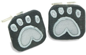 An individually handpainted fun pair of cufflinks with a single silver animal paw print on each cuff