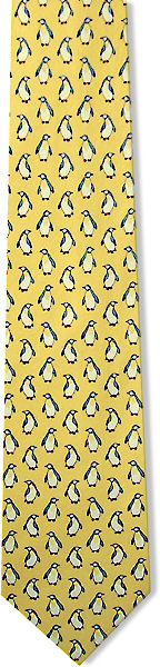A lovely yellow penguin tie with lots of little penguins all over
