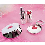 Set includes compact mirror, atomiser and keyring. Each in a presentation pouch