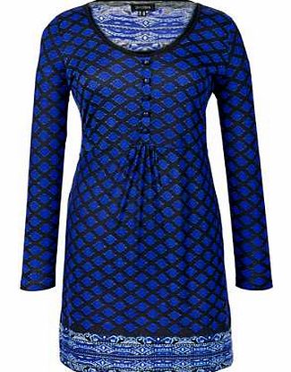 Tunic top in an attractive print, with decorative buttons in a stylish cut. In an A-line style which gathers at the waist, and contrasting print at the hem and upper back. A look for any occasion! Pomodoro Tunic Features: Hand wash 100% Viscose Lengt