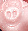 Porky Pigs - strawberry candy sweets with piggy faces on - some are happy.. some are not!!