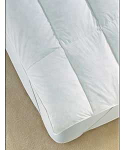 A 100 cotton covered mattress topper with extra filling in the central zone to provide superior comf