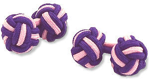 A pair of purple and pink elastic knot cufflinks.