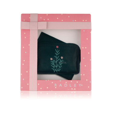 This gift set features a sleek leather travelcard holder and a small zip top coin purse. These colou
