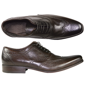 A Modern 5 eyelet Oxford from Jones Bootmaker. Features wing tip brogue detailing, Vintage look worn