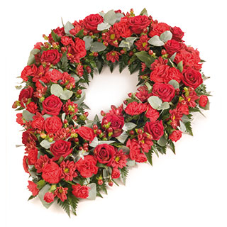 A special chaplet tribute of stunning velvet Red Roses and complementing flowers and foliage.
