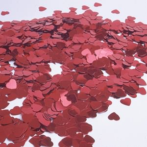 Red heart confetti looks great scattered over tables at parties or at weddings. You can even add