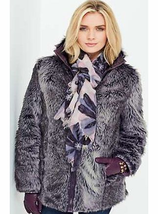 Long sleeved reversible coat with faux fur on one side and plain fabric on the other. Featuring a high collar with front zip fastening and side pockets. Coat Features: Reversible Zip fastener Washable Outer: 100% Polyester Faux Fur: 55% Acrylic, 45% 