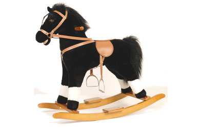 A lovely crafted solid wooden rocking horse. Finis