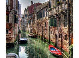 Hop on a high speed train from Rome to spend a full day exploring the canals of Venice, spending time admiring St Marks Basilica and Doges Palace.