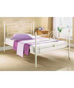 Ivory with brushed gold effect finials and stamps.Metal frame.Sprung mattress.Overall size (H)120,
