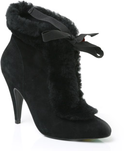 Suede ankle boot with ribbon lace up vamp and faux fur trim. The Safluffy boots have a pointed toe a