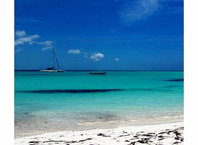 Sail on a beautiful 48-foot catamaran through the turquoise Caribbean Sea to the tropical paradise of Isla Mujeres where pirates once buried their treasure. Snorkel at a beautiful coral reef, parasail above the crystal clear waters, relax on the whit