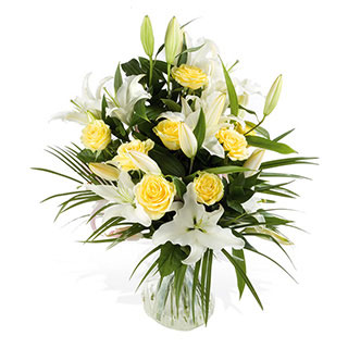 A stunning and Luxurious handtied bouquet of delicate Yellow Roses and scented elegant White Orienta