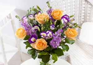 A charming mix of roses, lisianthus and stocks in a striking colour palette of soft peach and purples. Lavishly wrapped anddelivered with a personalised gift messageThis bouquet contains: 5 Peach Avalanche Roses 3 Purple Lisianthus 3 Lilac Stocks Lo