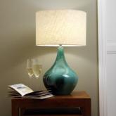 Ceramic lamps with an aqua and black glaze with circular double lined linen shade in cream and flex-