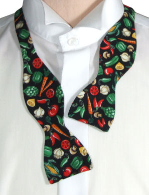 Get your five veg a day with this self-tie bow tie sporting chilis, peppers, carrots, garlic, corn, 