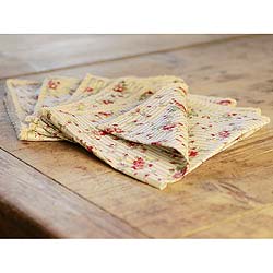 The delightful antique rose pattern on our table linen is reminiscent of designs on traditional